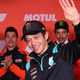 Valentino Rossi waves goodbye at his final press conference as a MotoGP rider.